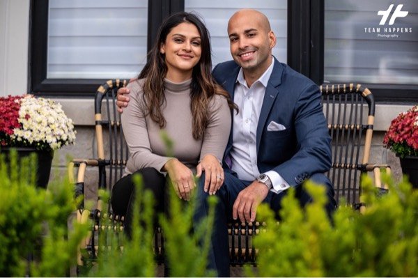Couple sitting together on a porch