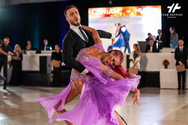 Ballroom couple in front of the judges