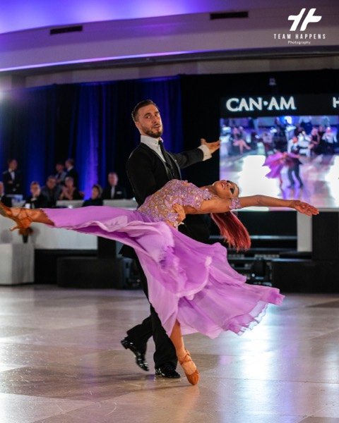 Dancer in a long lean across the floor