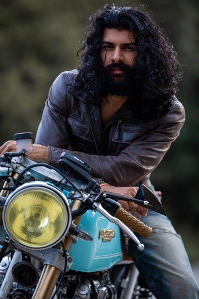 Rider looking down at his motorcycle